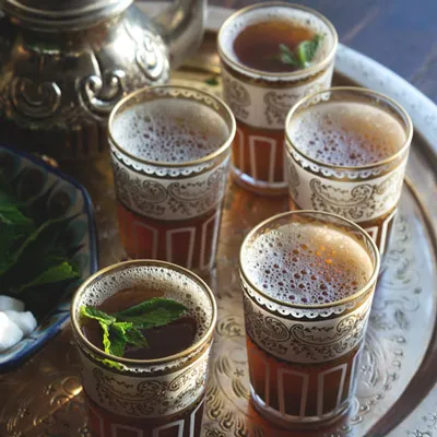Group of glasses full of infusion color amber.