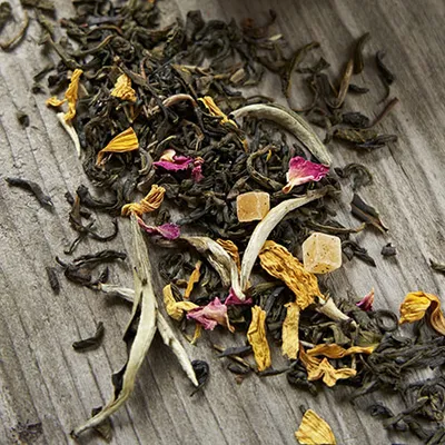 Close-up of tea leaves with petals colorful.