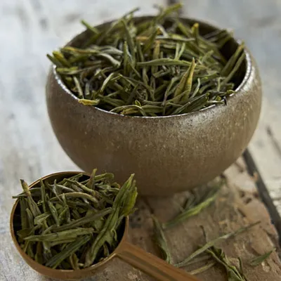 Close-up of bowl with tea green dried.