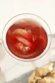 Overhead view of with drink pink in with glass transparent.