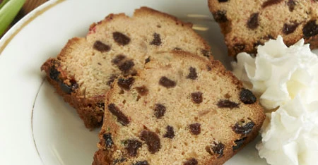Fetta of cake served on plate.